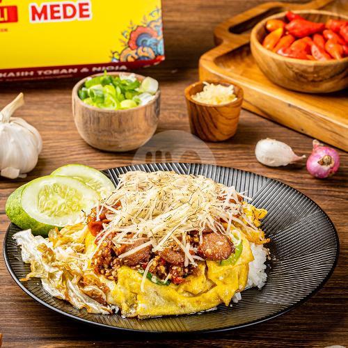 Close-up of Ayam Geprek Neng Neli’s signature chicken smashed with fiery sambal bawang mede.